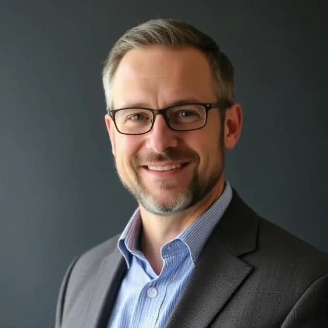 Headshot of James Maxwell